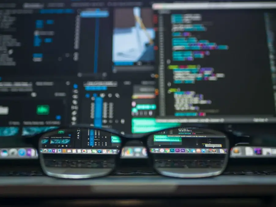 glasses and a computer monitor